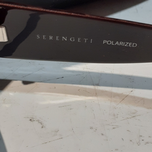 266 - Serengeti Savona 7066 genuine sunglasses. Showing some light lens scratches but sound frames and ori... 