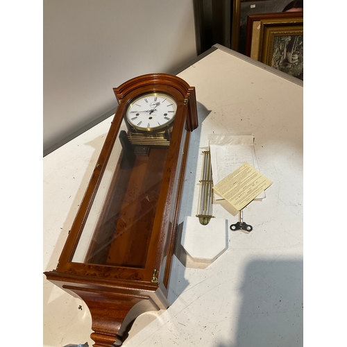 285 - Large wooden wall mounted Commiti of London clock with original instructions and key