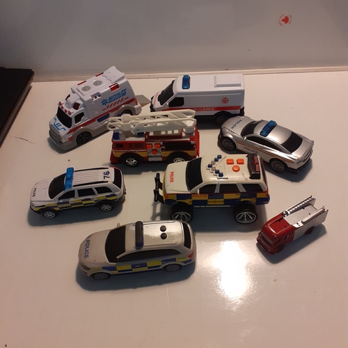 1 - A quantity of cars mainly emergency services, police, fire and ambulance vehicles.