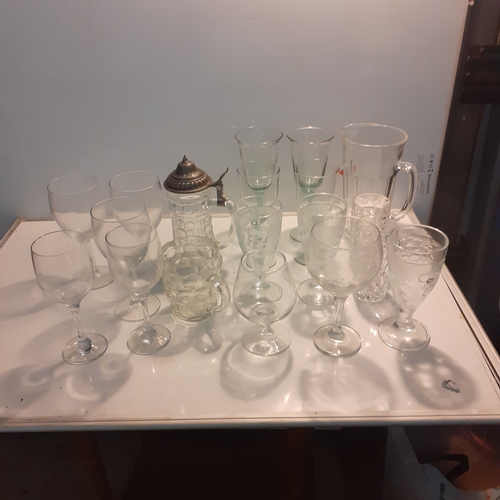 19 - Large quantity of glasses. A lidded Stein, extra large wine, brandy, dimple pint glass and more. All... 