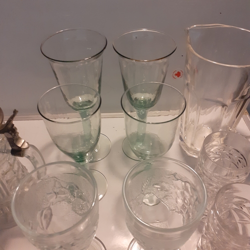 19 - Large quantity of glasses. A lidded Stein, extra large wine, brandy, dimple pint glass and more. All... 