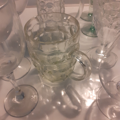 19 - Large quantity of glasses. A lidded Stein, extra large wine, brandy, dimple pint glass and more. All... 