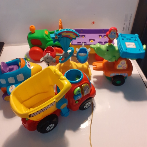 6 - Some larger plastic children's toys. Some make noises amd Some need batteries. It looks like there m... 