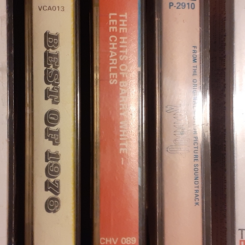 15 - A quantity of vintage cassette tapes in case. Including 10cc, The best of 1976, The Hollies and more... 