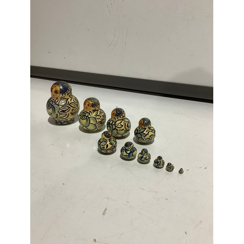 31 - Russian dolls - look to be hand painted - 10 in total