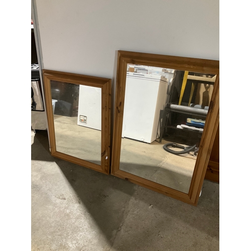 571 - Pair of pine surround mirrors - tallest is 90x60cm