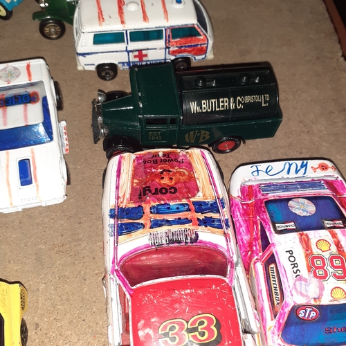 355 - Quantity of Diecast vehicles Corgi and matchbox etc. Some have been drawn on /coloured pen. Will nee... 