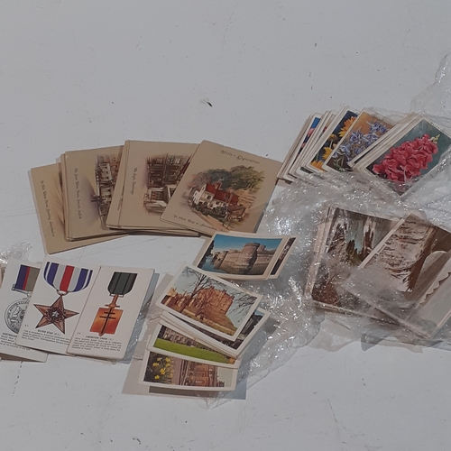 4 - Quantity of vintage cigarette cards including wills and others. Not complete sets