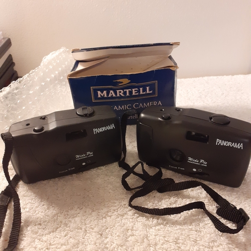 17 - 2 panorama wide pic wind on cameras, one promoted by Martell with box. Wind on and click as they sho... 