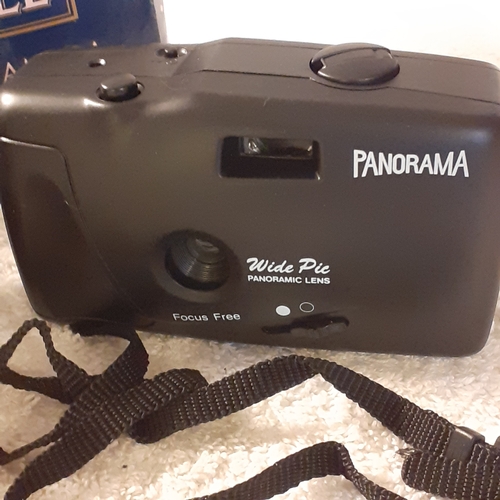 17 - 2 panorama wide pic wind on cameras, one promoted by Martell with box. Wind on and click as they sho... 