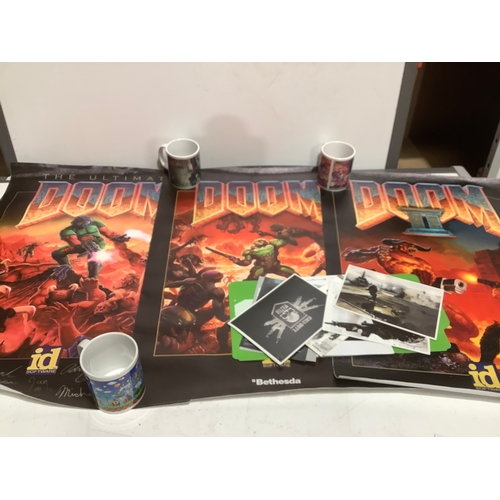 60 - 3x Doom video game canvas, 3 gaming related mugs & Call of Duty limited edition post cards