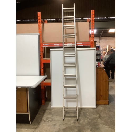 31 - Very long extending ladder - each section approx 8 foot