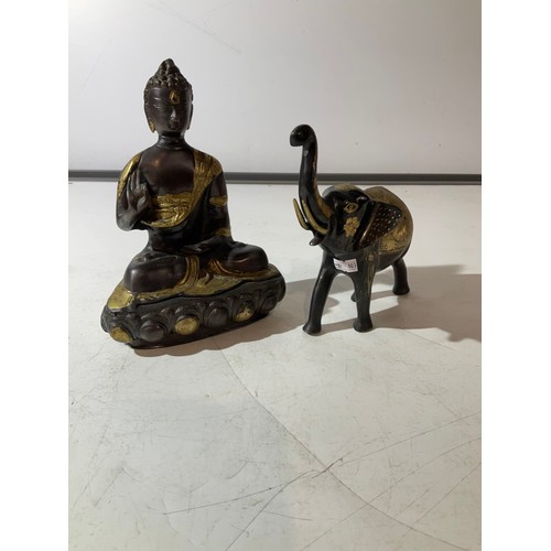 77 - Cast metal black & gold Buddha & elephant