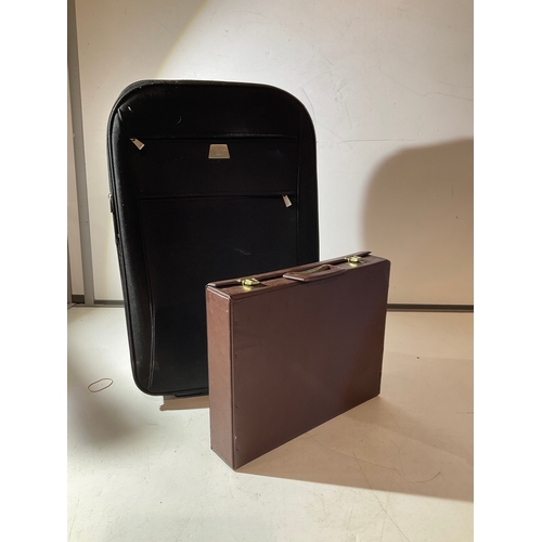 285 - Large travel case & smaller leather case