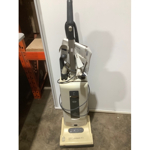 516 - Sebo automatic x1.1 upright hoover with spare filters