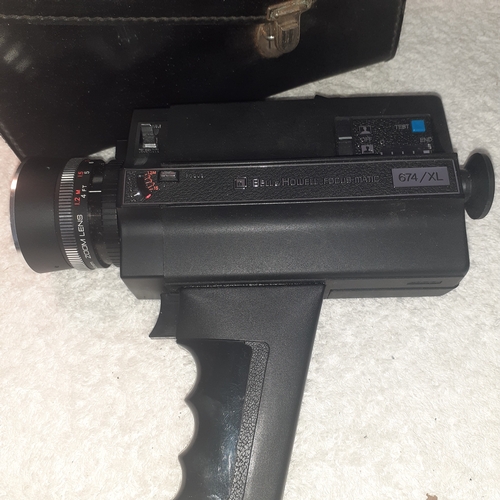 27 - A vintage Bell and Howell focus-matic. Model 674/XL. With original case. Untested but good clean con... 