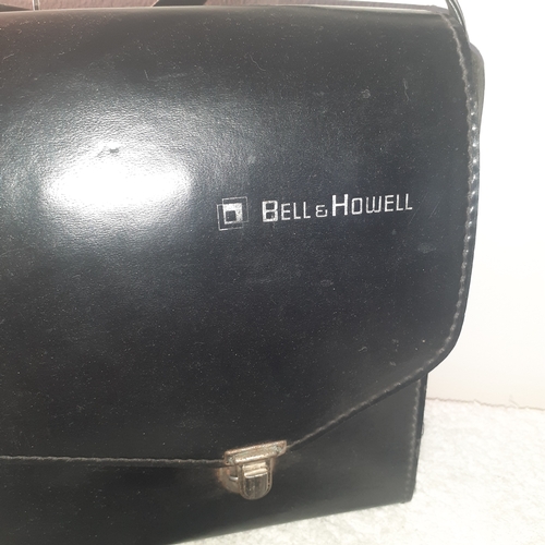 27 - A vintage Bell and Howell focus-matic. Model 674/XL. With original case. Untested but good clean con... 