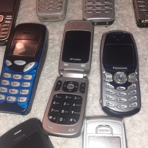 1 - A quantity of old mobile phones, mostly Nokia with a couple of other brands present. No chargers, un... 