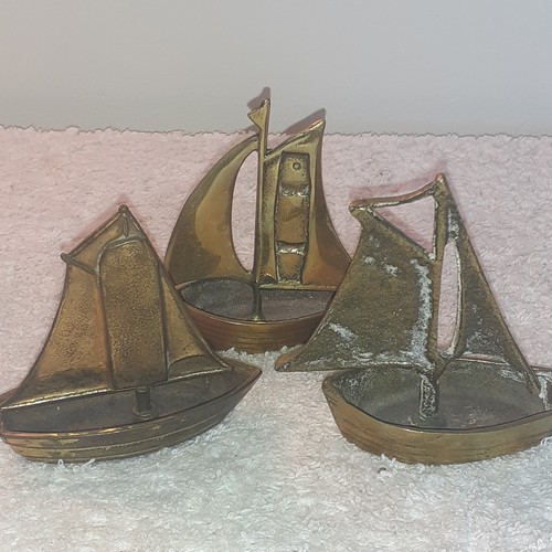 24 - 3 brass sailing boats. One is stamped peerage