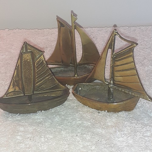24 - 3 brass sailing boats. One is stamped peerage