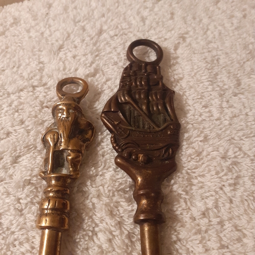 30 - 5 brass toasting forks with decorative handles including a windmill, elephant,  ship and more