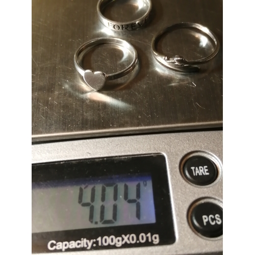 23A - 3 x silver rings 4.04 grams Size J, K and N