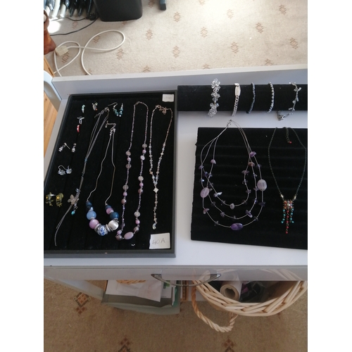 40A - 3 trays of mixed jewellery including necklaces, bracelets, rings and earrings (trays not included)