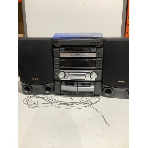 255 - Aiwa hifi stereo stacking system including 3 x CD player, twin tapes and a turntable. With speakers.