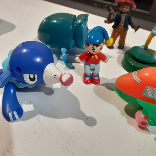 10 - A small collection of toy figures including noddy, Marge Simpson and more