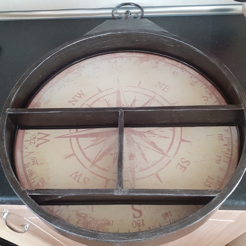 1 - Large round metal shelves in design of compass/clock. Great condition.