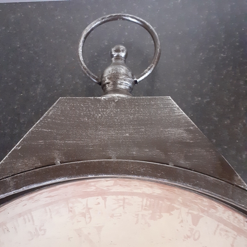 1 - Large round metal shelves in design of compass/clock. Great condition.