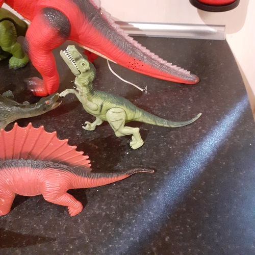 6 - A quantity of toy dinosaurs.  Some battery operated, untested. Back missing from one but otherwise g... 