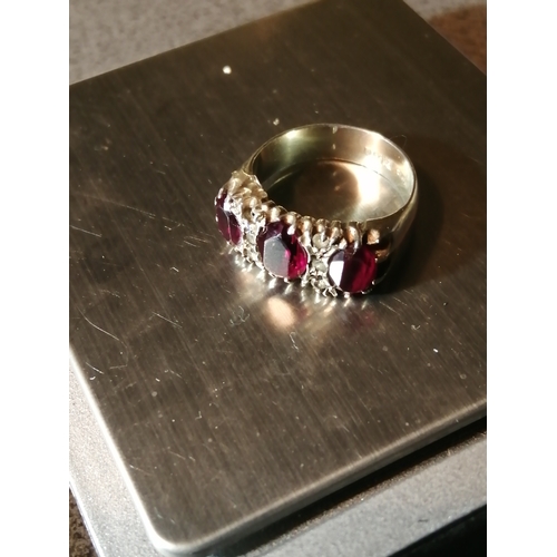 29A - Silver ring set with trilogy of red gemstones 5.16 grams Size P