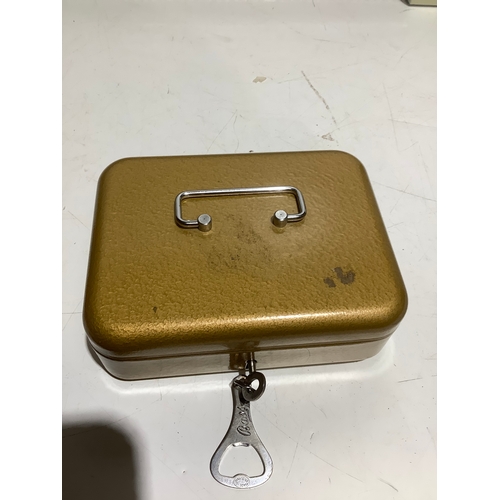43 - Metal cash tin with key