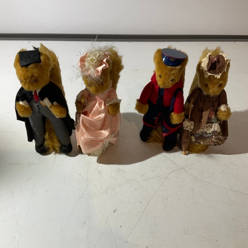 86 - 4 character squirrels postman, school master, and 2 Victorian ladies