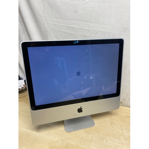 76 - Apple iMac A1224, EMC 2133, core 2, 2GB, 320Gb - needs resetting