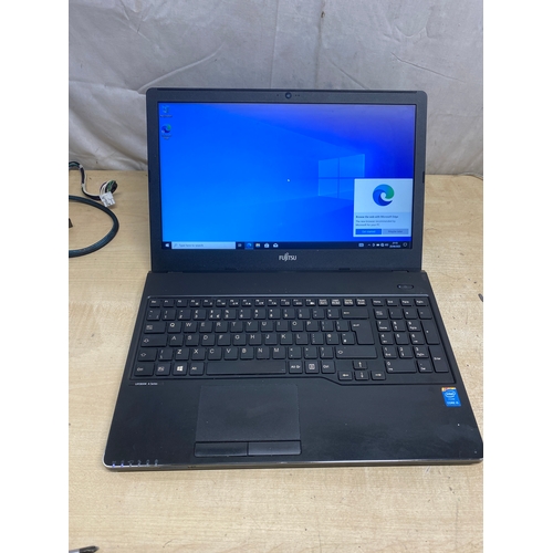 245 - Fujitsu Siemens laptop, i5-2nd, 4GB, 500GB hard drive - windows 10 with charger