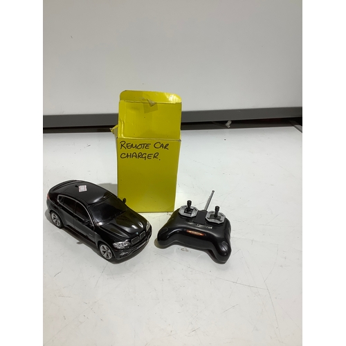 357 - BMW x6 remote  controlled car and charger