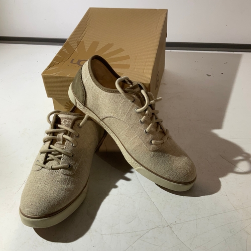 145 - A pair of beige canvas shoes by UGG size 8.5 new in box