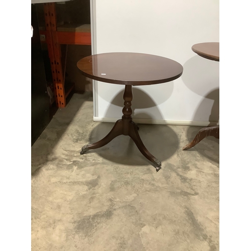 255 - Pair of dark wood circular tables