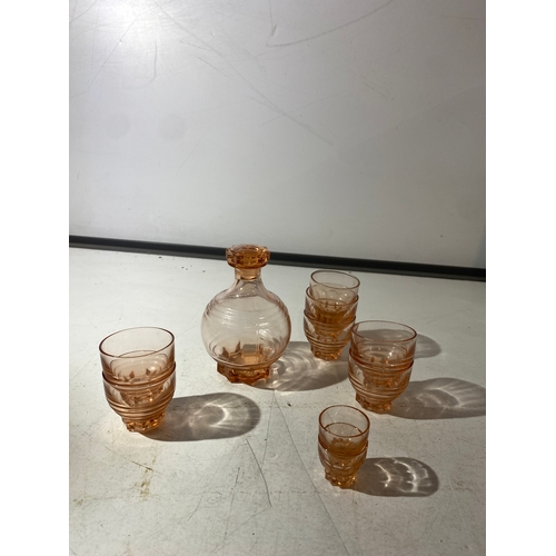 497 - Orange translucent decanter with 6 glasses & 2 shot glasses