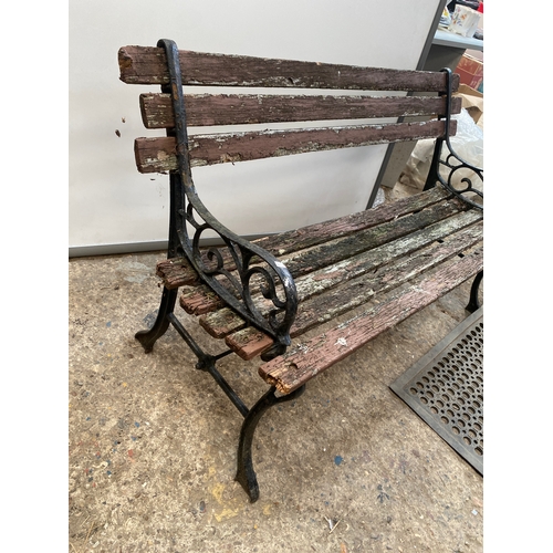 27 - Garden bench with cast iron ends in need of some TLC