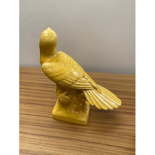 64 - Ceramic yellow parrot ornament