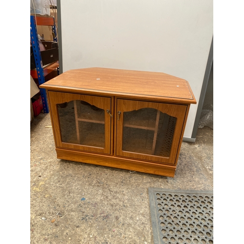 357 - Glazed door tv cabinet