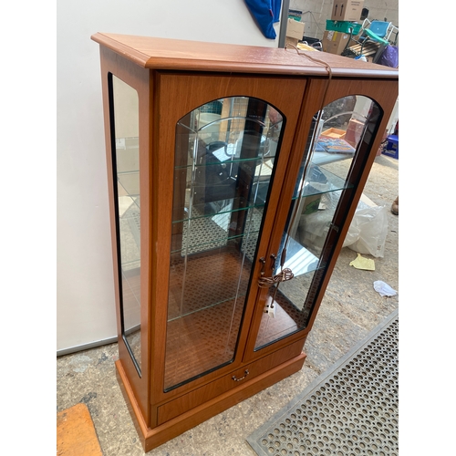 449 - Morris style or possibly Morris, Teak effect display cabinet with shelves and glazed doors. Good con... 