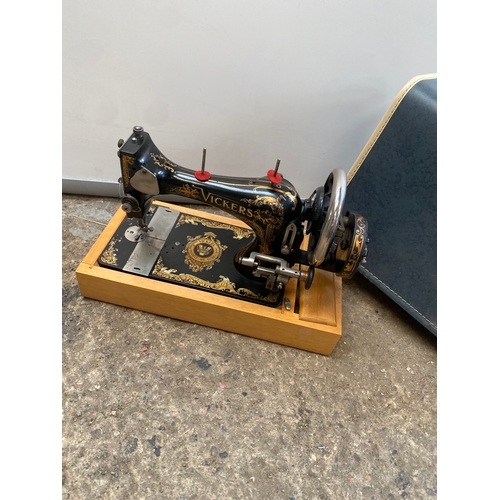 467 - Vintage sewing machine in case