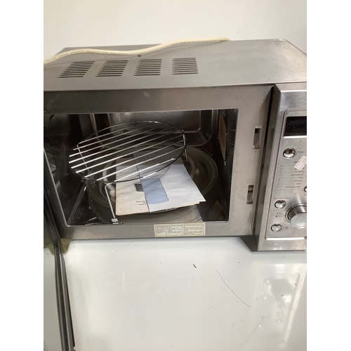 319 - DeLonghi Combi grill microwave oven