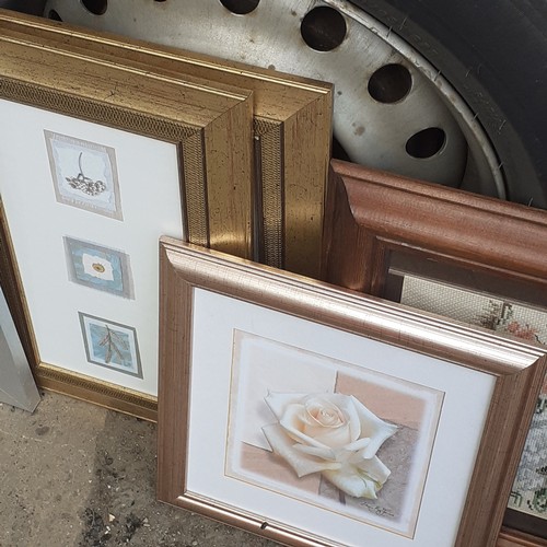 35 - Large quantity of picture frames - some with gold gilt & some with woven samplers