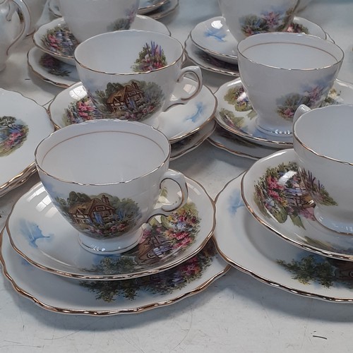 39 - Quantity of Royal Vale tea service, mainly in trios and includes teapots