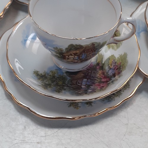 39 - Quantity of Royal Vale tea service, mainly in trios and includes teapots